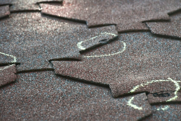 After a hailstorm, your roof can have damage similar to this roof. The roof inspectors circled problem areas.