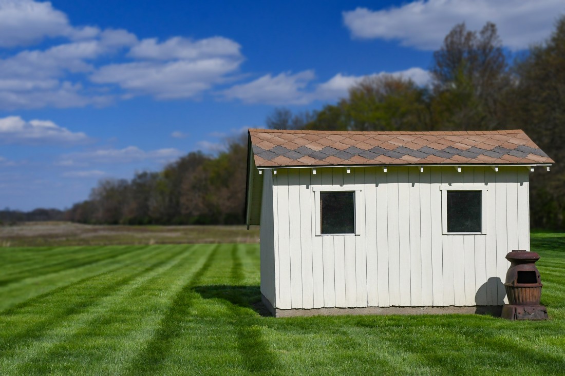 small house in green fields 