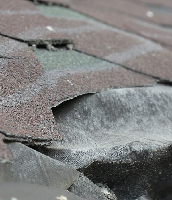 damaged and leaky Roof After a Hail Storm