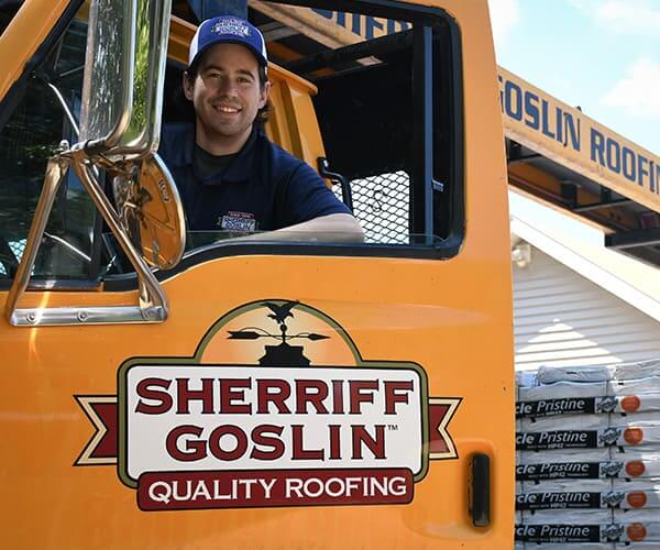 Sherriff Goslin Roofing team on Company truck 