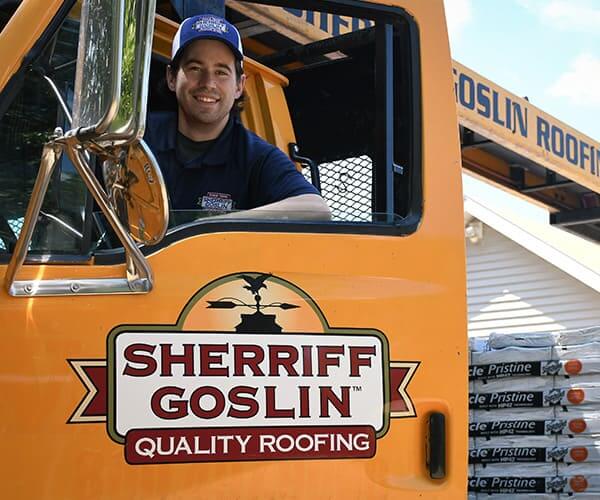Sherriff Goslin Roofing team on Company truck
